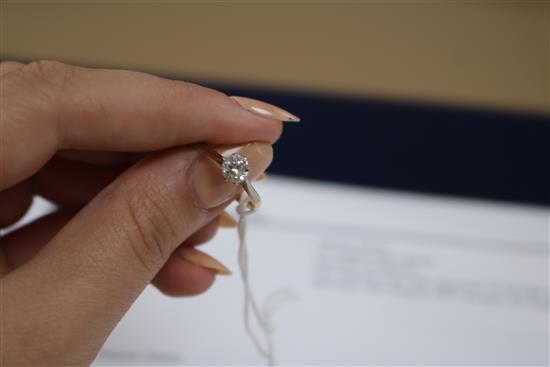 An 18ct gold and platinum solitaire diamond ring,